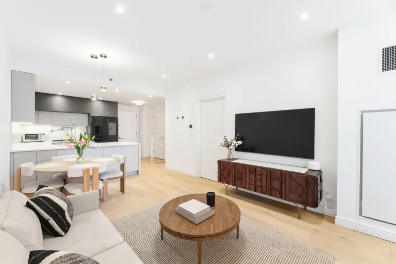 Open living area flowing into the kitchen