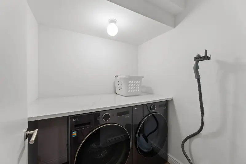 Laundry room with washer and dryer